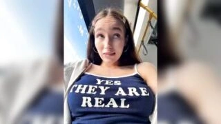 Playful Brunette Teasing with ‘Yes They Are Real’ Top on Public Transit & Outdoors