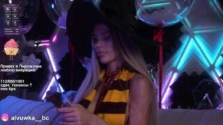 Sexy Blonde in Witch Hat at Neon Party – Cosplay Halloween Vibes